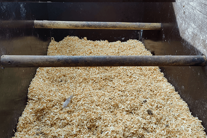 bedding inside a chicken coop