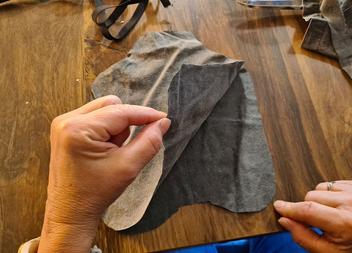 Two parts of fabric that make up the chicken saddle