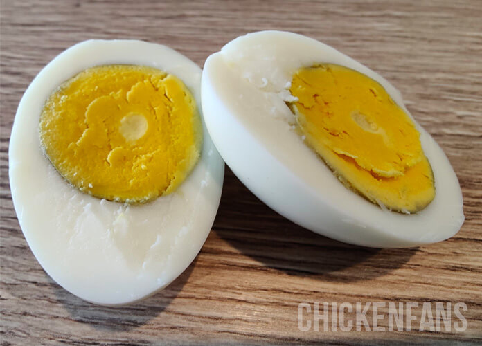 chicken egg with green ring around the egg yolks