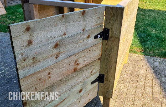 diy chicken coop door with hinges installed