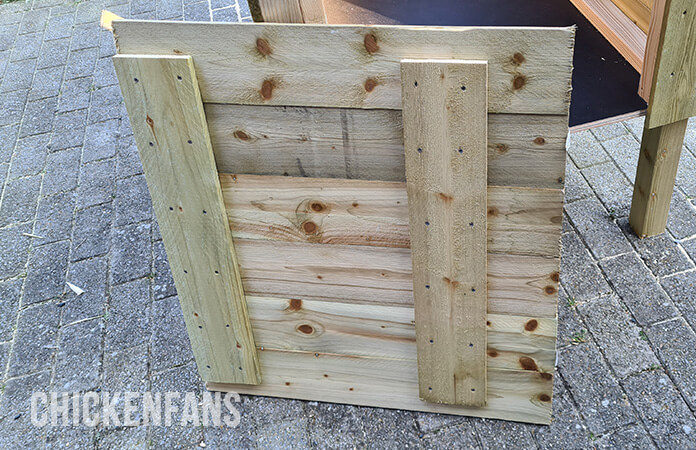 diy chicken coop door made from sidings