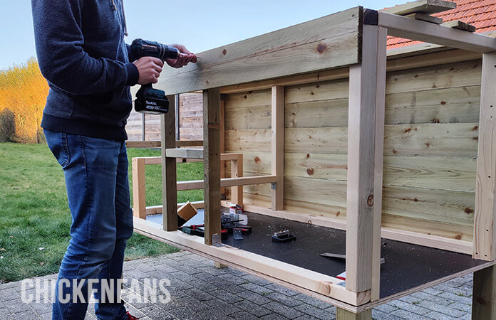 diy chicken coop screwing the sidings