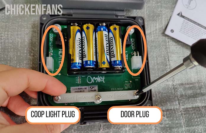 The inside of the control panel of the omlet auto door