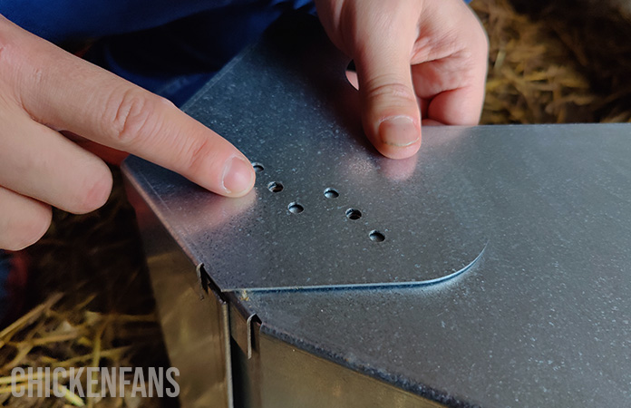 the holes in the feed tray of the free range feeder give you the opportunity to adjust the height of the tray