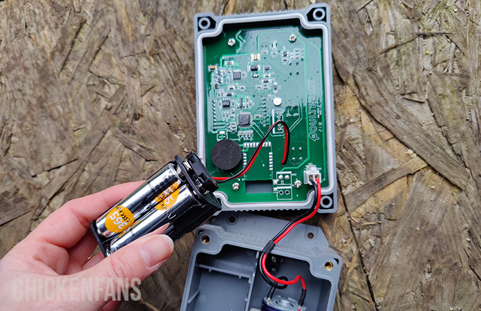batteries inside the control panel of a happy henhouse coop door