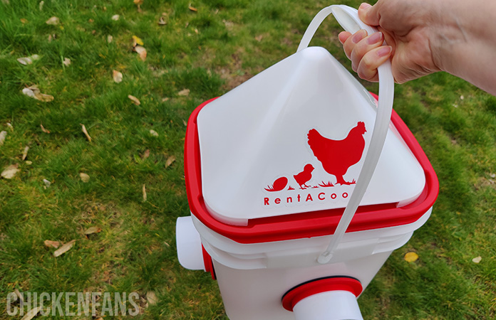 the handle on a rentacoop chicken feeder