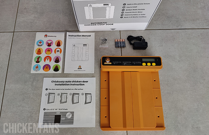 what is inside the package of the Chickcozy automatic coop door