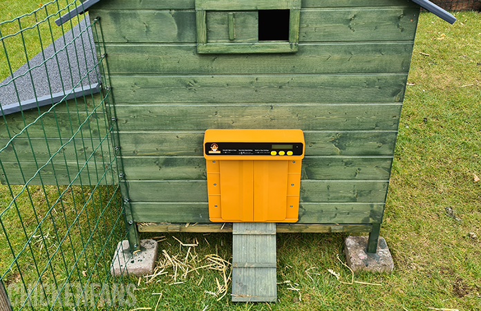 the chickcozy automatic coop door in the closed position