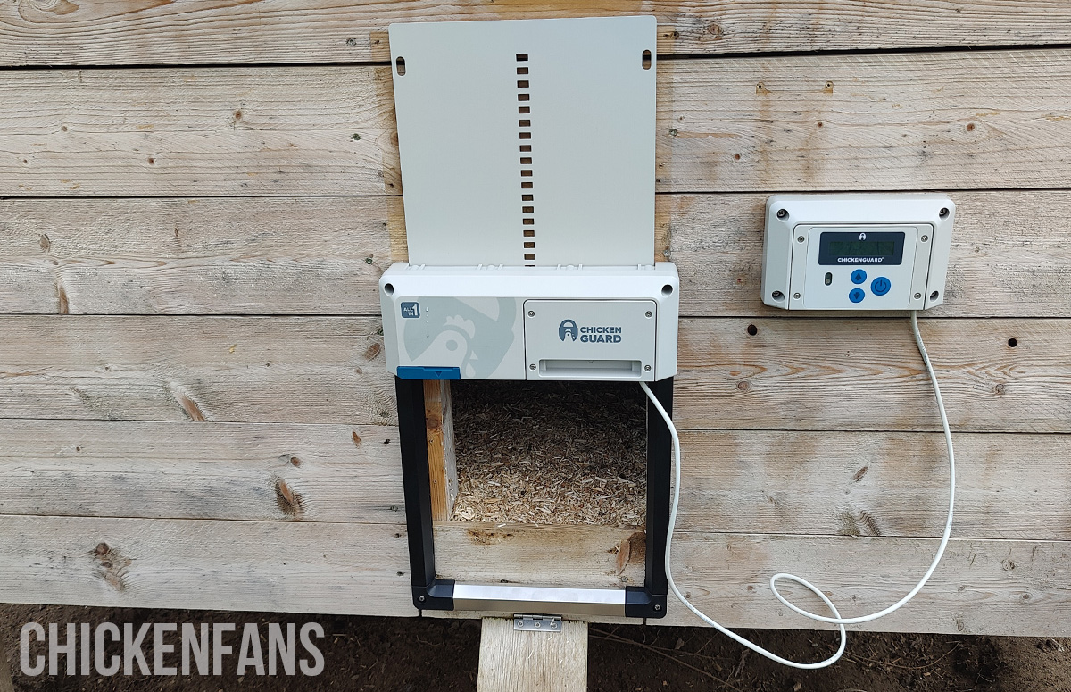 the complete setup of the ChickenGuard all in one chicken coop door